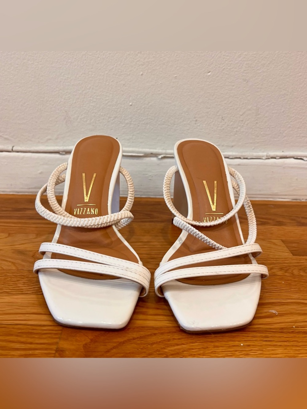 Vizzano white strappy heels with an approximate 4" heel